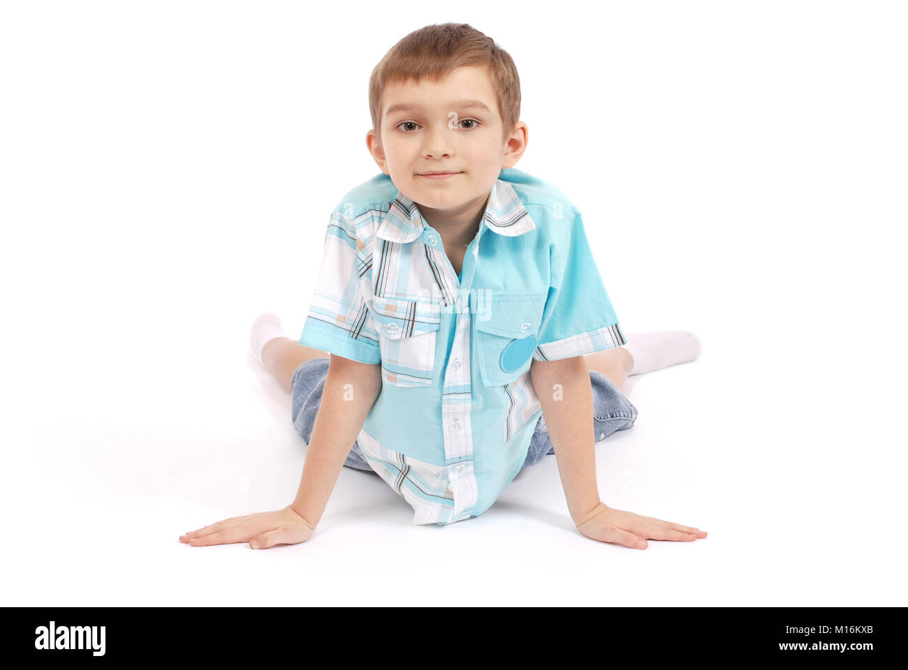 The boy poses, isolated on white background Stock Photo