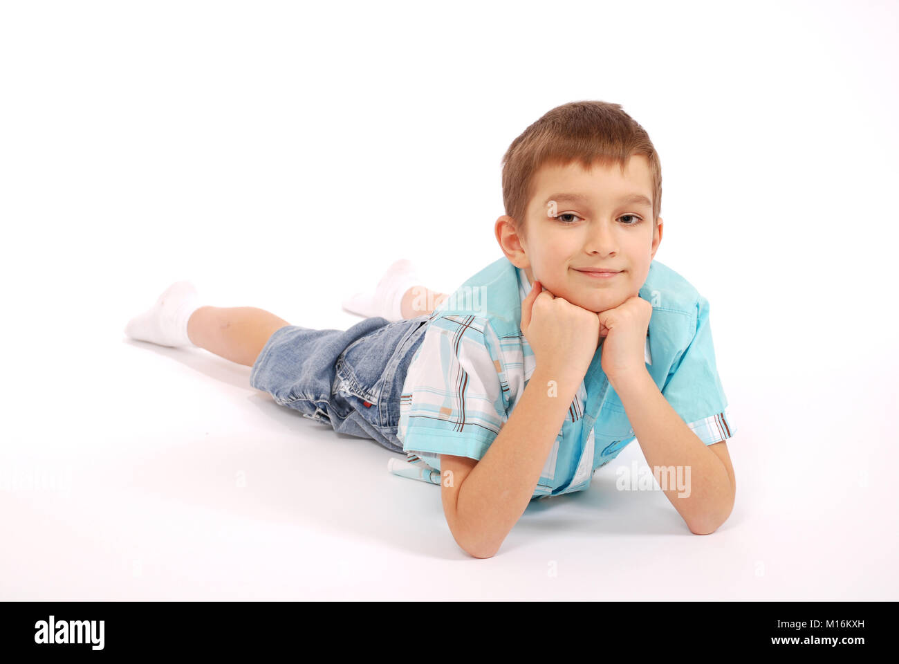 The boy poses, isolated on white background Stock Photo - Alamy