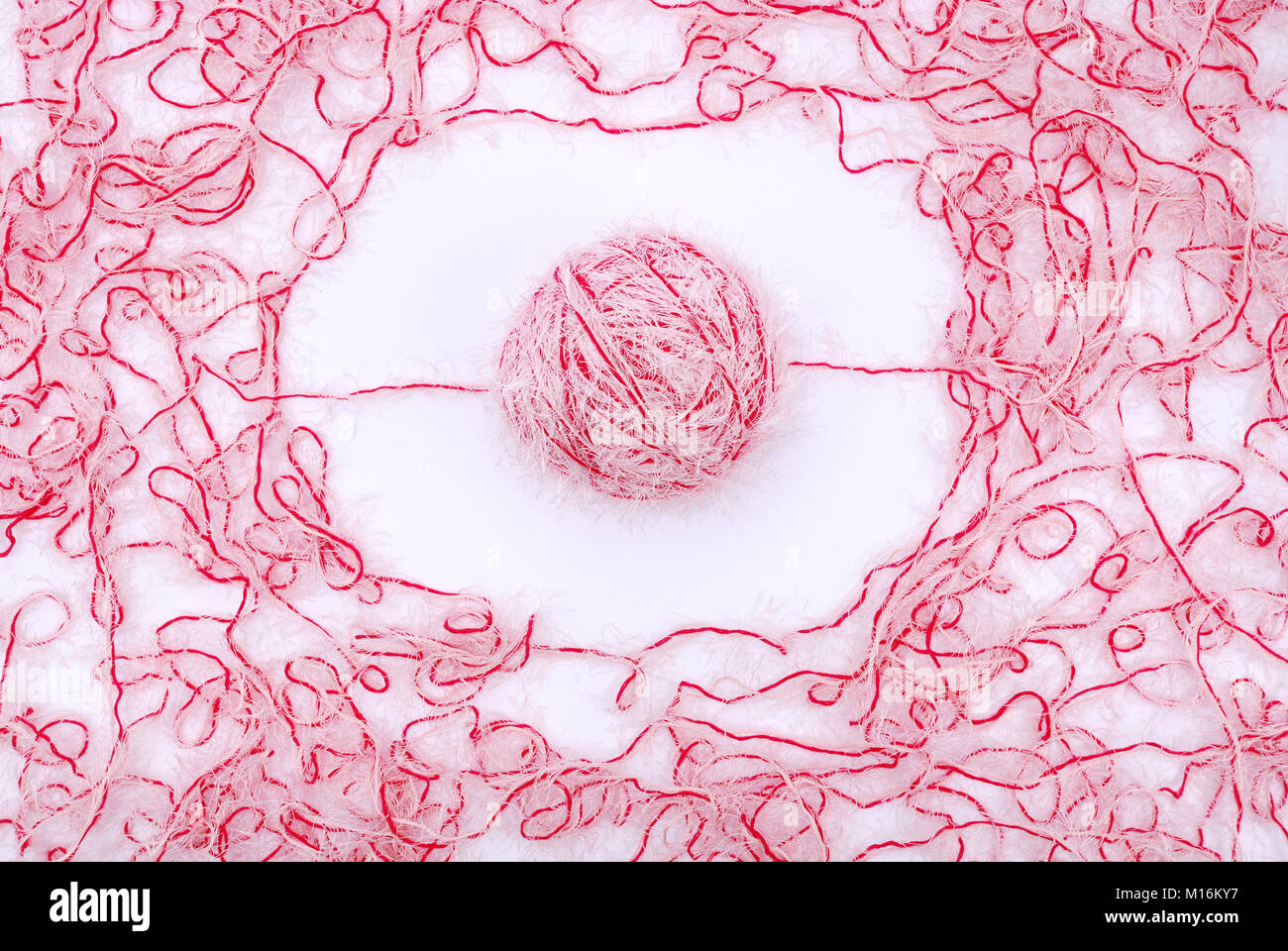 red and white threads clew isolated on a white background Stock Photo ...