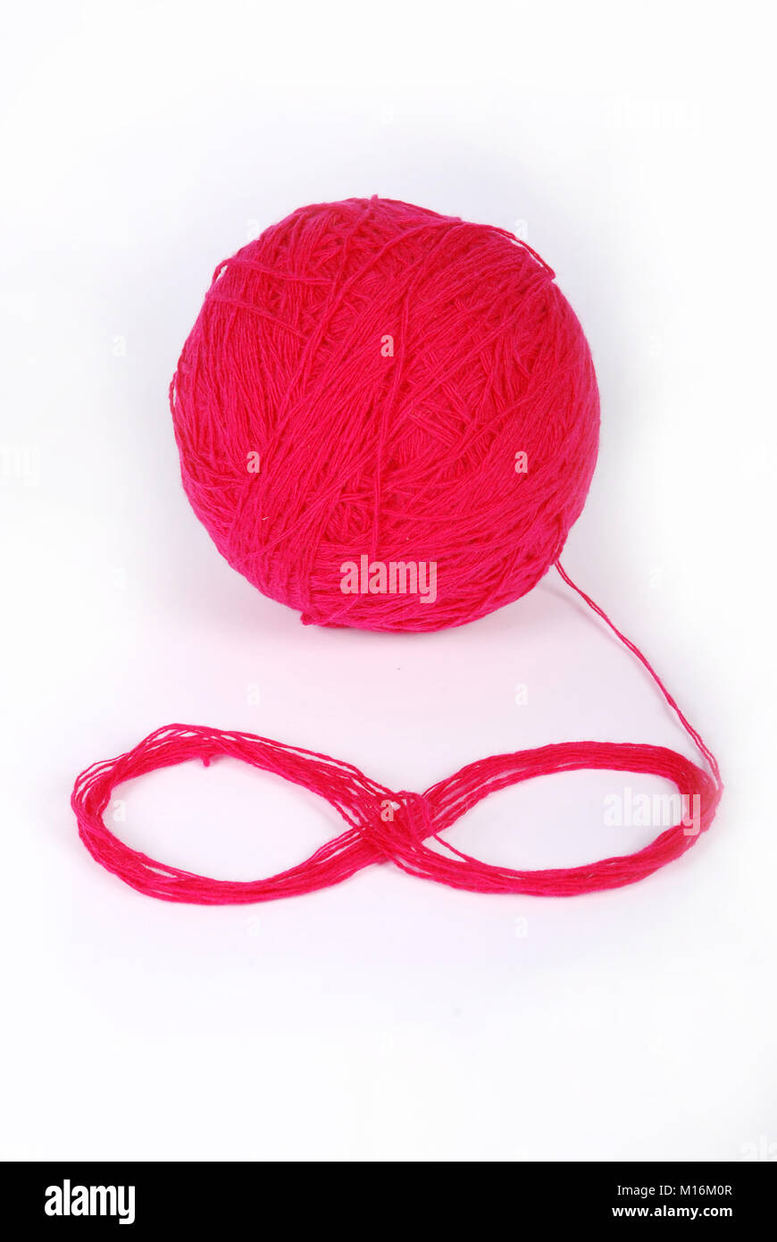 red threads and clew isolated on a white background Stock Photo Alamy
