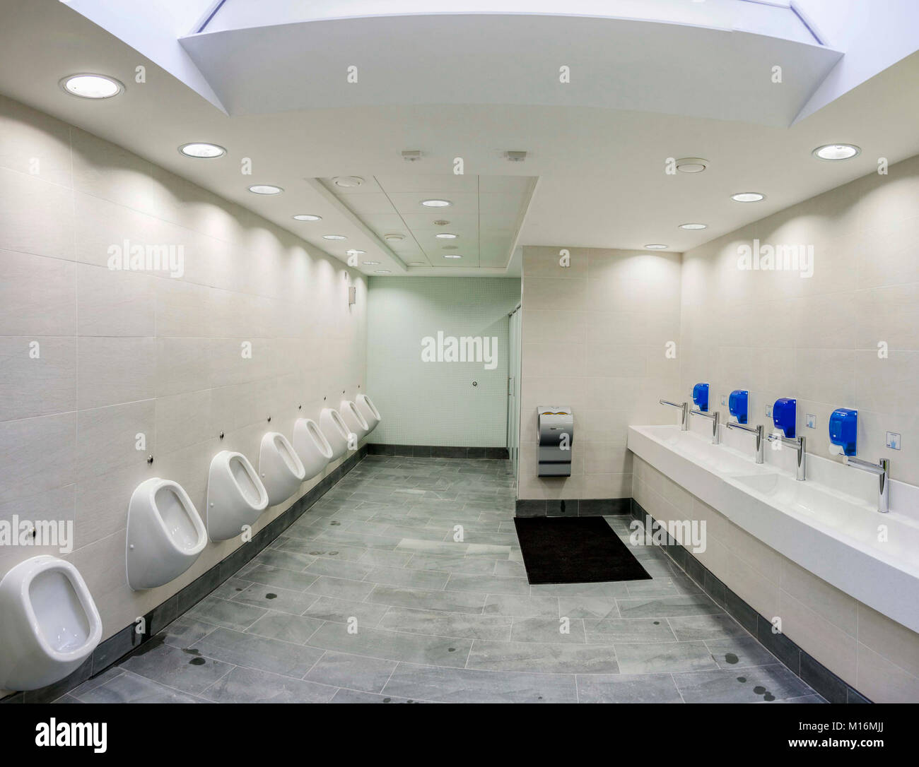 Gents toilet urinals Stock Photo