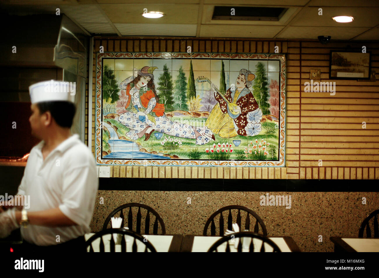 DUBAI, UNITED ARAB EMIRATES - October 17, 2008: A tile mural based on the Iranian love story of Layla and Majanon, in Tehran Restaurant in the Deira. Stock Photo