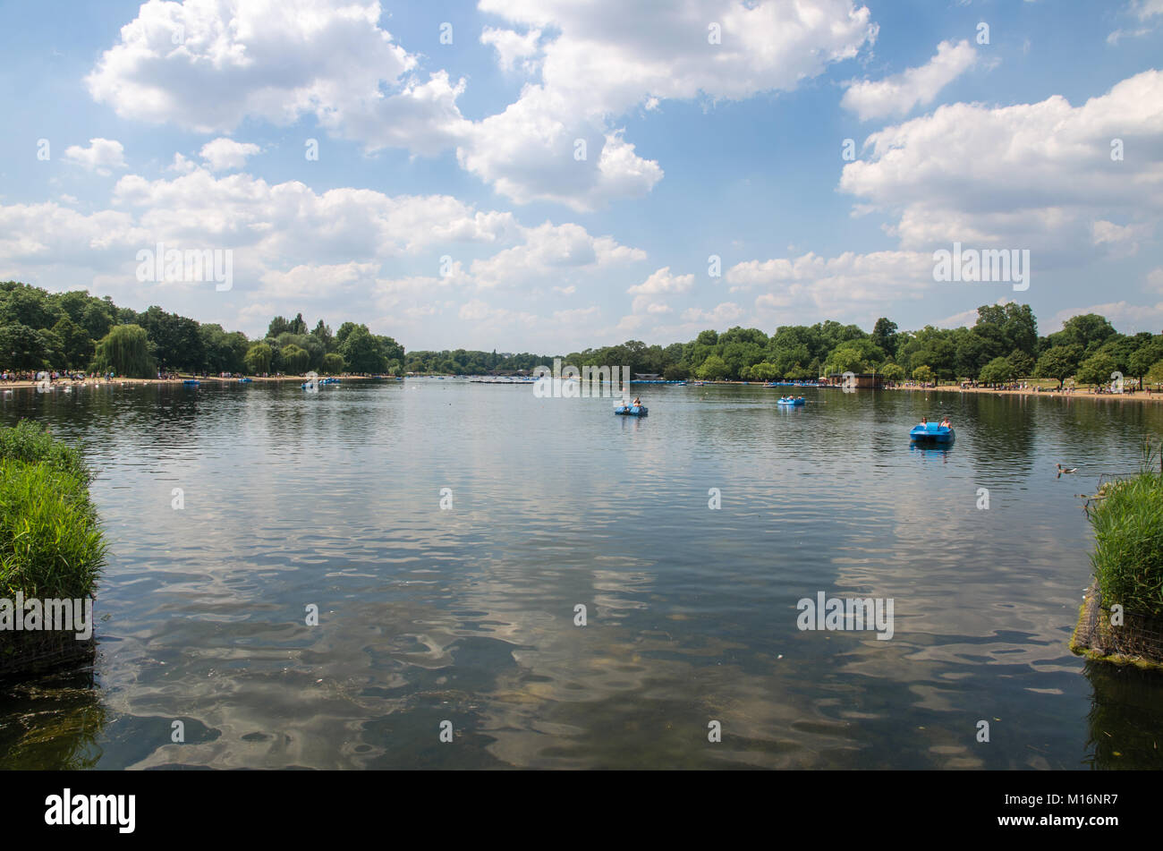 Boats on the Serpentine at Hyde Park on a summer's day, London, England Stock Photo