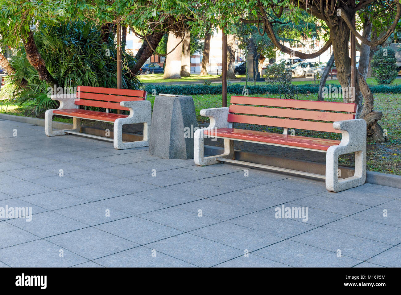City Park Or Street With Green Trees And Tile Two Neat Benches