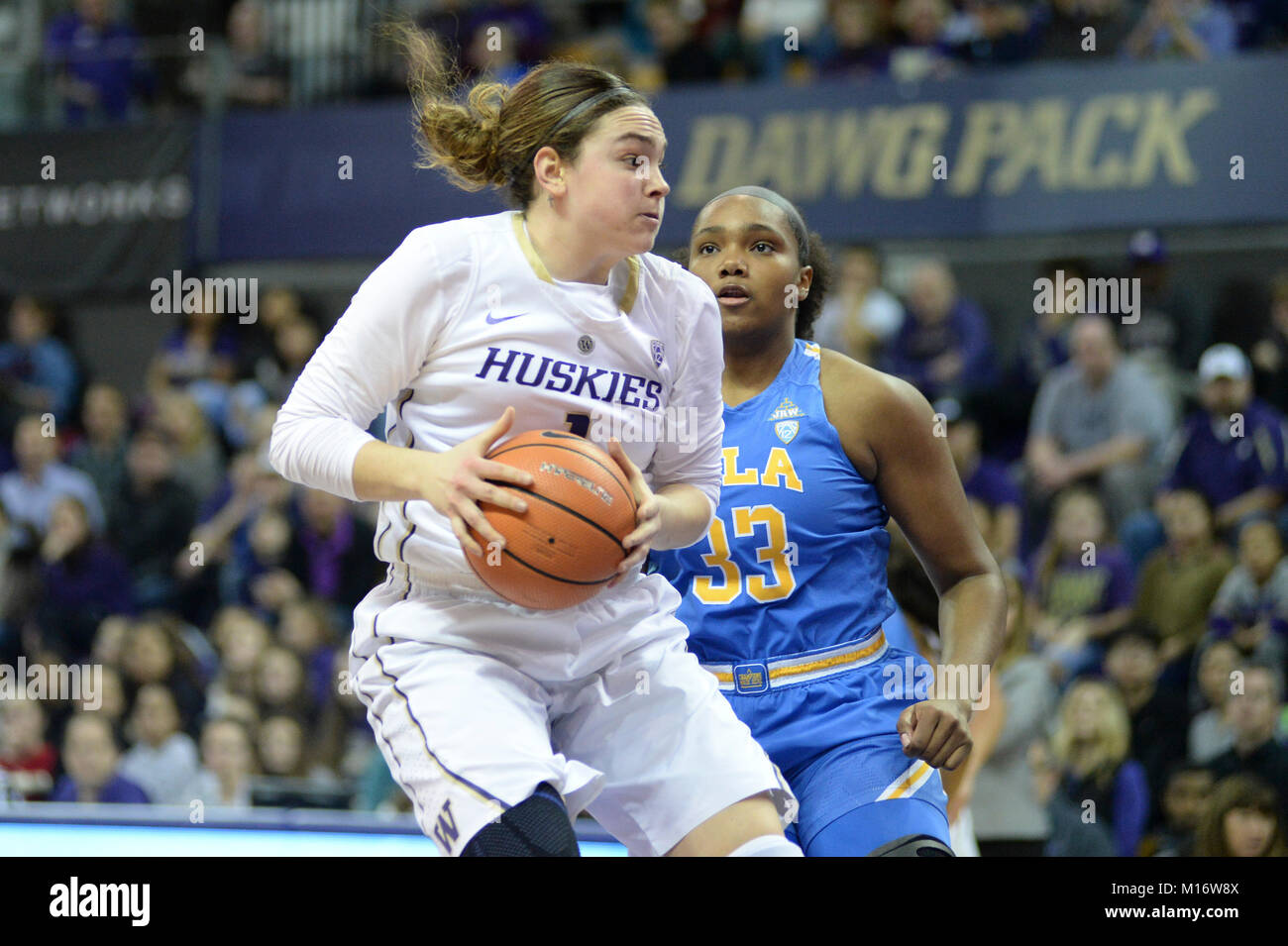 Seattle, WA, USA. 26th Jan, 2018. UW center Hannah Johnson (1) drives to the basket against UCLA's Lauryn Miller (33) during a PAC12 womens basketball game between the Washington Huskies and UCLA Bruins. The game was played at Hec Ed Pavilion in Seattle, WA. Jeff Halstead/CSM/Alamy Live News Stock Photo