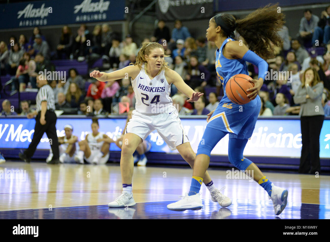 Seattle, WA, USA. 26th Jan, 2018. UW point guard Jenna Moser (24) defends against UCLA guard Jordin Canada (3) during a PAC12 womens basketball game between the Washington Huskies and UCLA Bruins. The game was played at Hec Ed Pavilion in Seattle, WA. Jeff Halstead/CSM/Alamy Live News Stock Photo