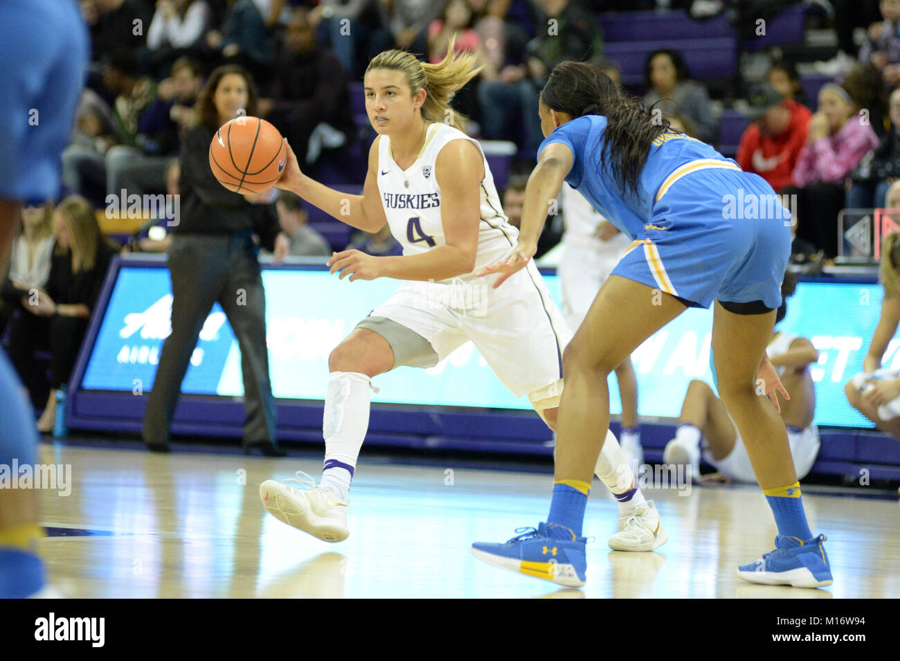 Seattle, WA, USA. 26th Jan, 2018. UW guard Amber Melgoza (4) works against Jordin Canada (3) of UCLA during a PAC12 womens basketball game between the Washington Huskies and UCLA Bruins. The game was played at Hec Ed Pavilion in Seattle, WA. Jeff Halstead/CSM/Alamy Live News Stock Photo