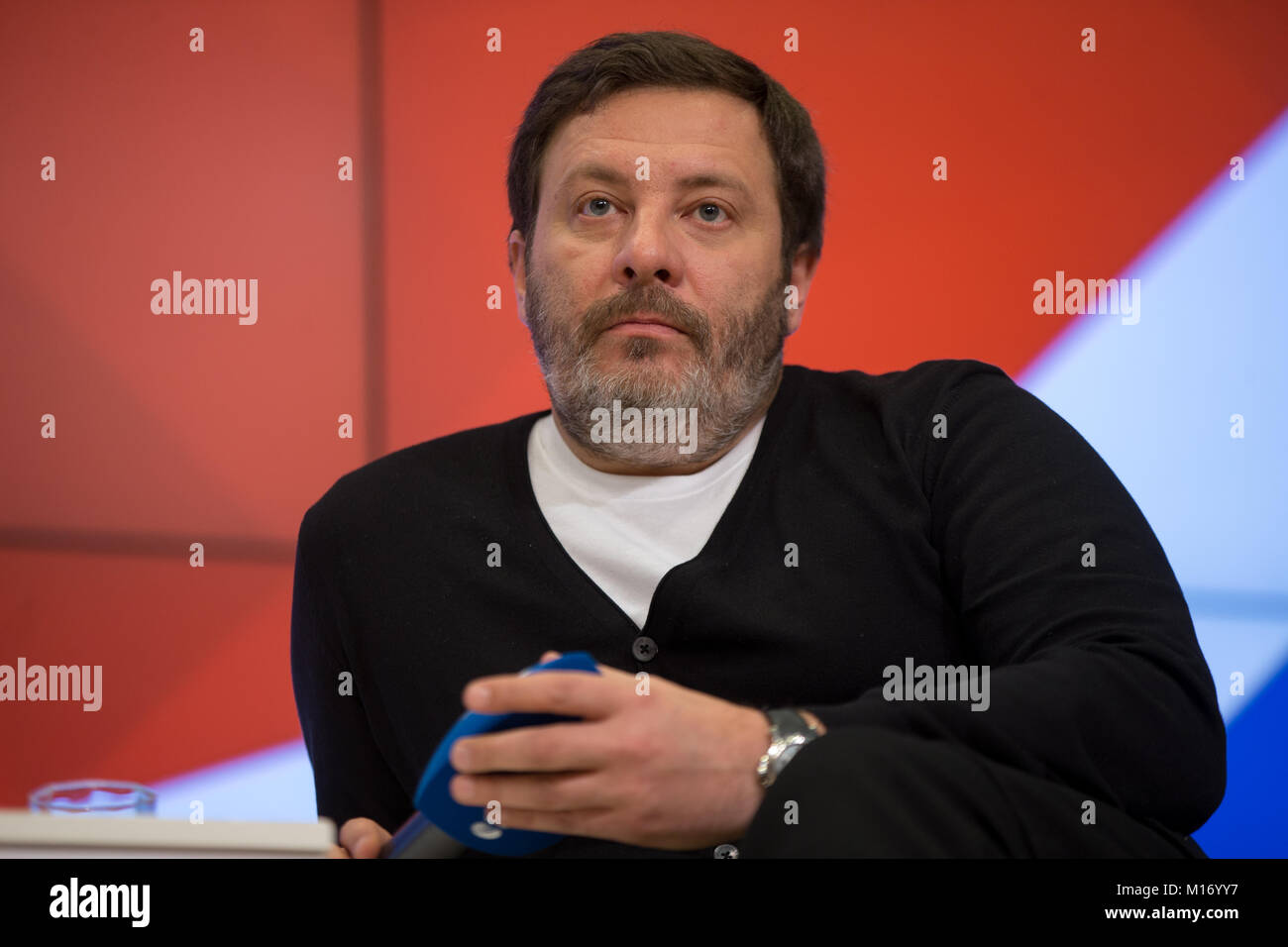 Moscow, Russia. 25th January, 2018. Author and scriptwriter Sergei Minayev at a news conference ahead of the press-preview of the Selfie film at the Rossiya Segodnya news agency's international multimedia press center. Credit: Victor Vytolskiy/Alamy Live News Stock Photo