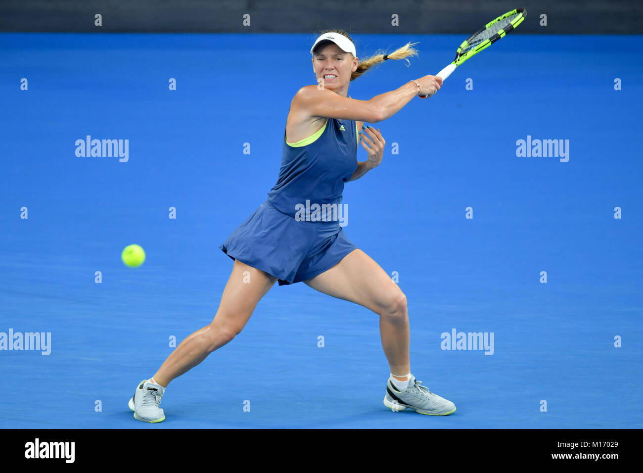Melbourne, Australia. 27th Jan, 2018. Number two seed Caroline Wozniacki of Denmark in action in the Women's Final against number one seed Simona Halep of Romania on day thirteen of the 2018 Australian Open Grand Slam tennis tournament in Melbourne, Australia. Sydney Low/Cal Sport Media/Alamy Live News Stock Photo