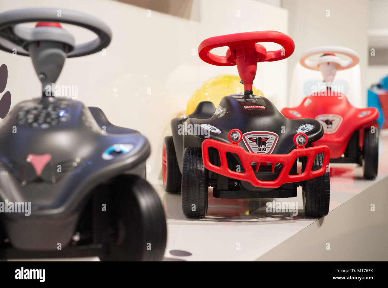Fuerth, Germany. 26th Jan, 2018. Toy vehicles called 'Bobby-Car' by Simba Dickie are exhibited during the annual press meeting of the toy manufacturers Simba Dickie and Maerklin regarding the Nuremberg International Toy Fair, in Fuerth, Germany, 26 January 2018. Credit: Timm Schamberger/dpa/Alamy Live News Stock Photo