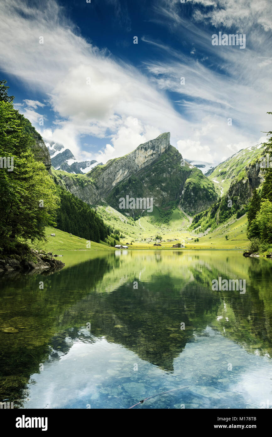Tranquil scene of seealpsee lake reflecting the mountain of Alpstein, Appenzell, Switzerland Stock Photo