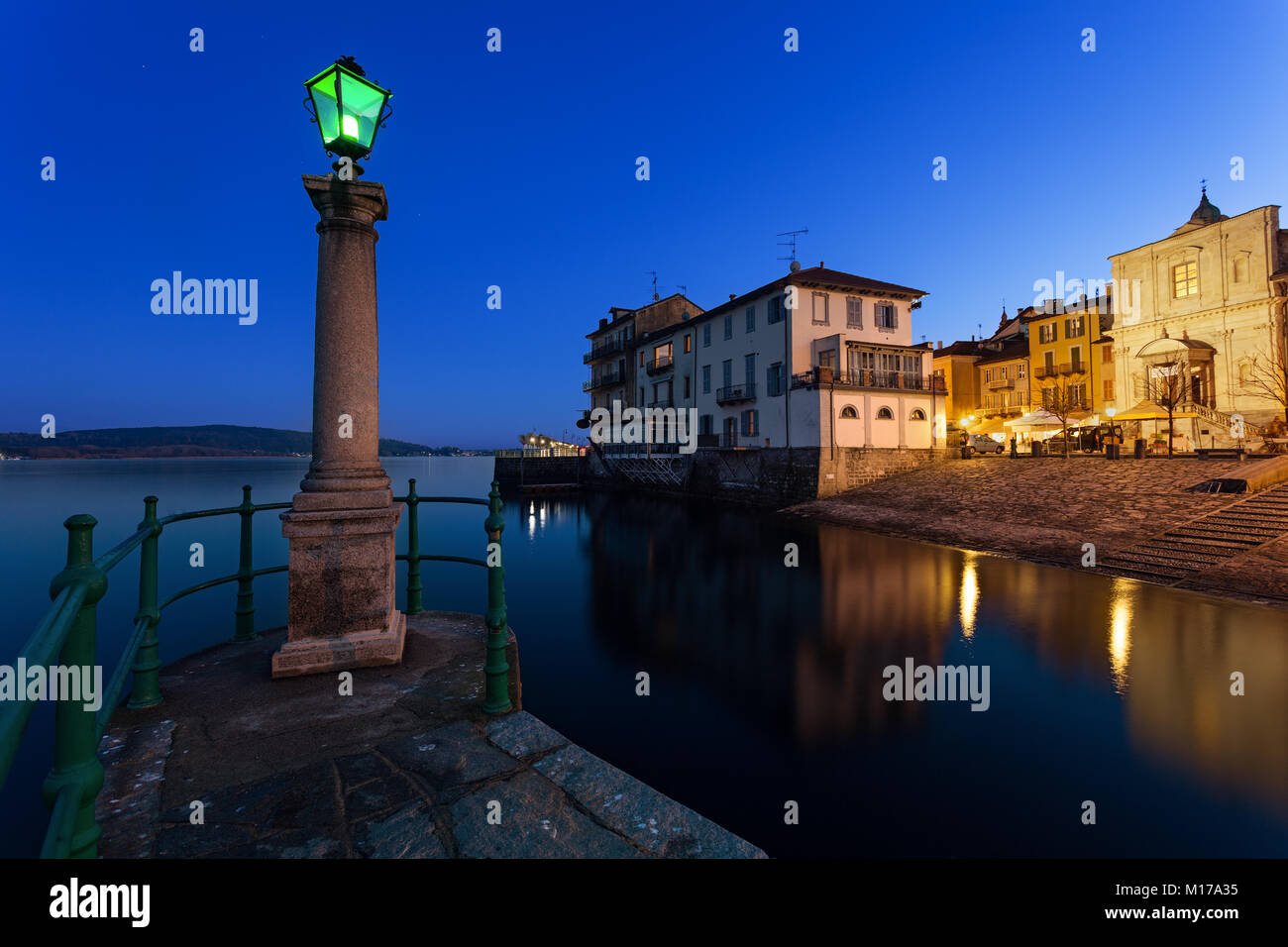 Reflections On The Water By The Lake At Sunset Arona Lake Maggiore reflections-on-the-water-by-the-lake-at-sunset-arona-lake-maggiore