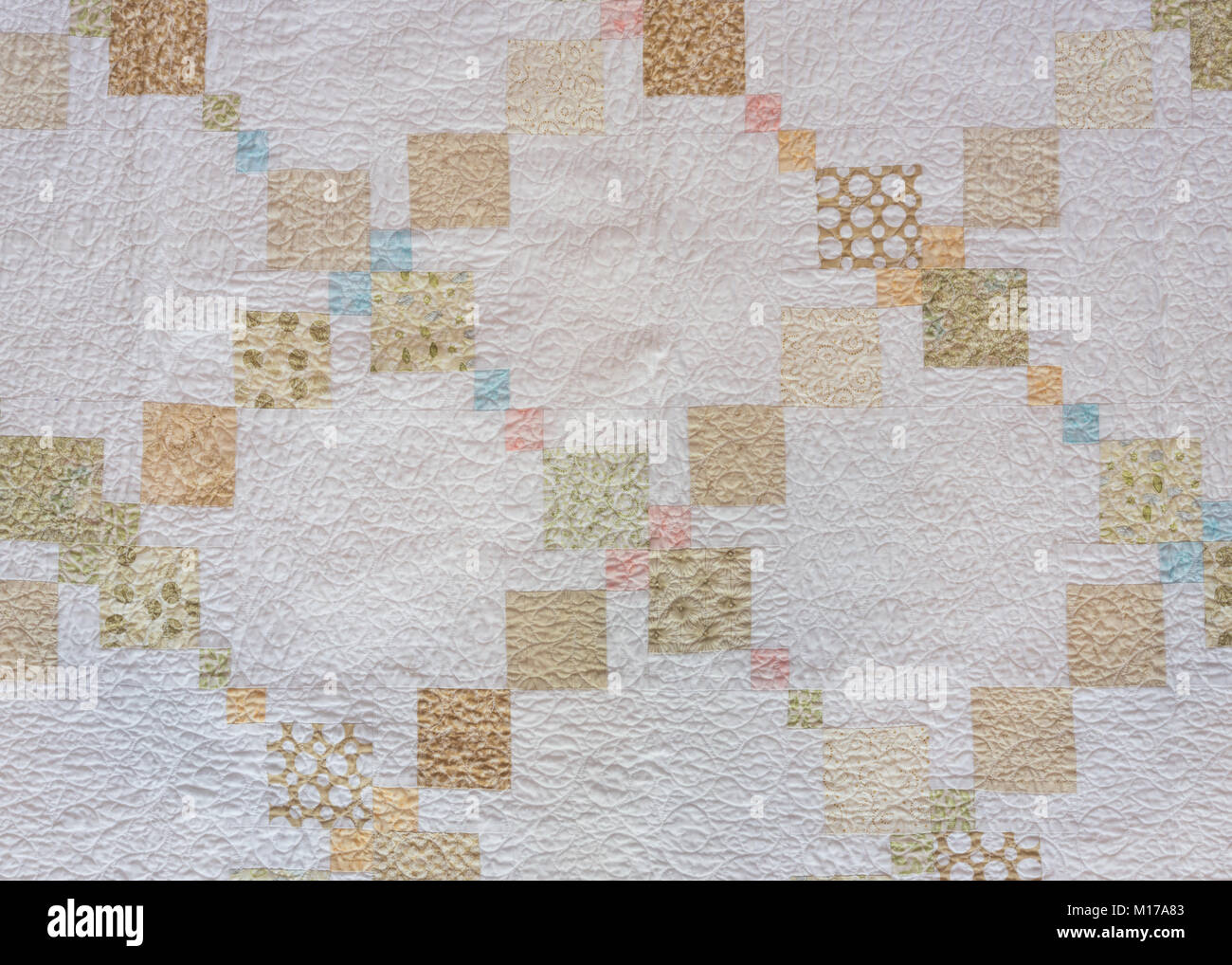 Tan and Neutral Quilt Squares on cream background Stock Photo