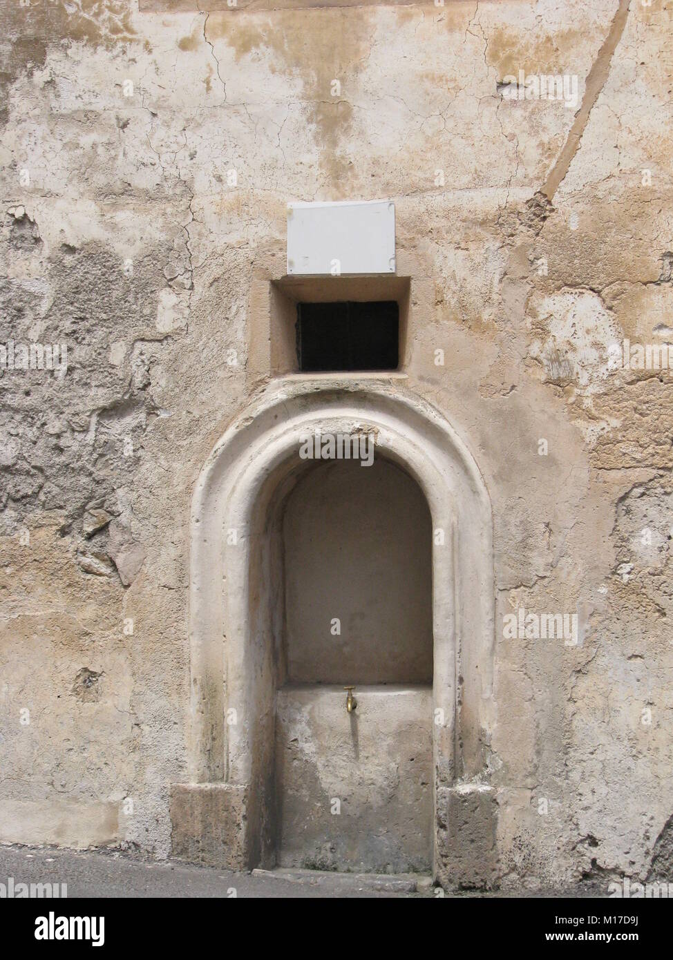 Dry fountain in Arta, Mallorca, Spain Stock Photo