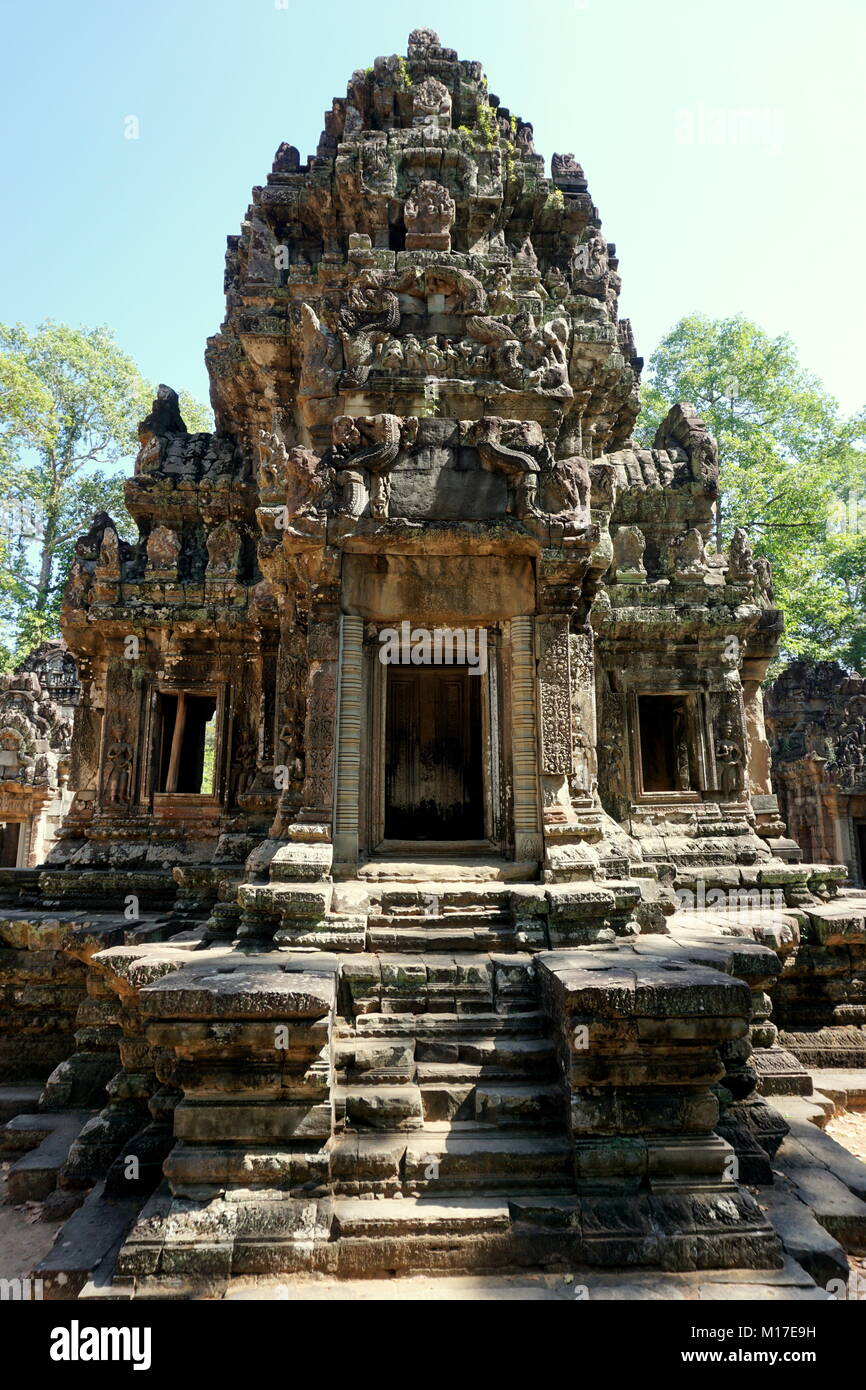 Entrance to an ancient temple in Angkor, with the jungle in the background. Stock Photo