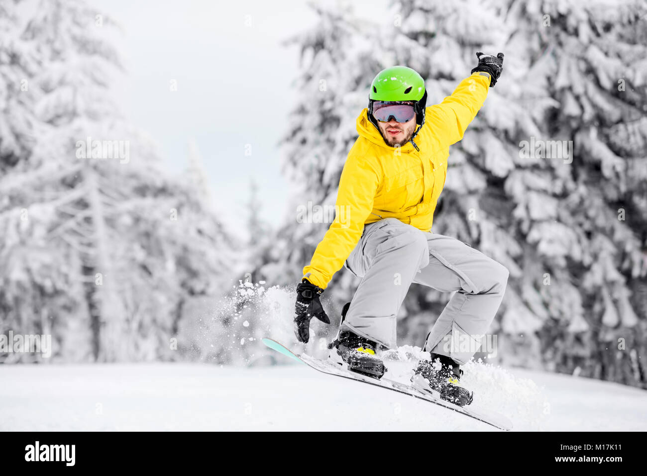 Man snowboarding at the mountains Stock Photo