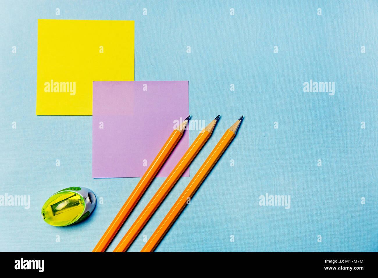 stickers, sharpener,record sheets and pencils Office theme Stock Photo