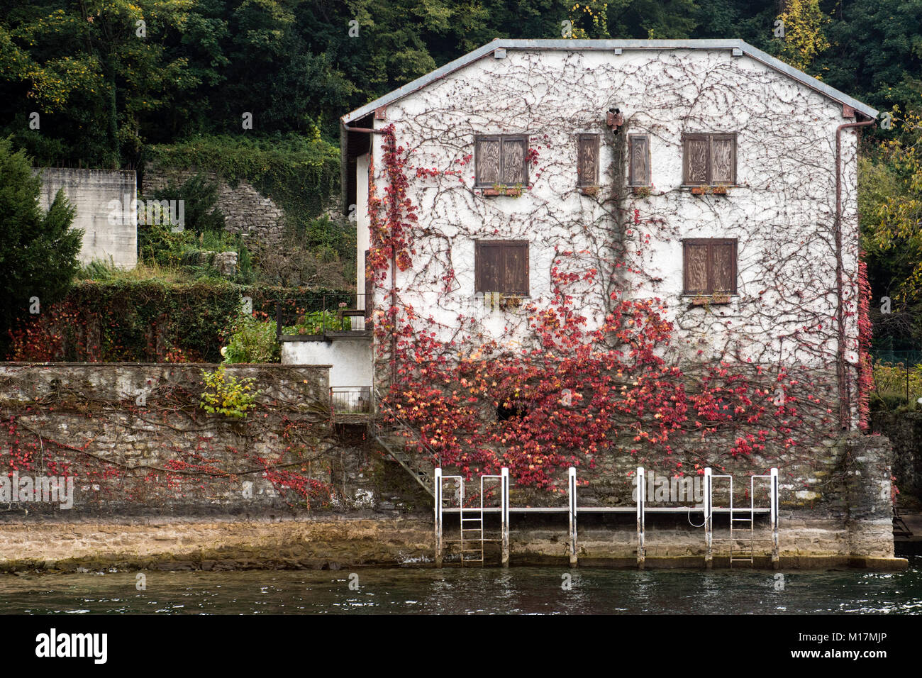 House with autumn leaves,Italy, Lombardy, Lake Como, Stock Photo