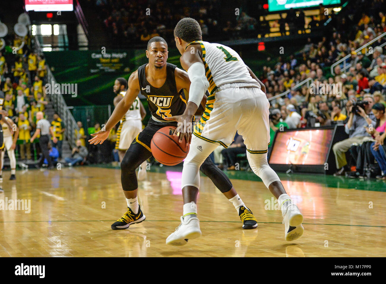 Fairfax, Virginia, USA. 27th Jan, 2018. MALIK CROWFIELD (13) defends against JUSTIN KIER (1) during the game held at EagleBank Arena in Fairfax, Virginia. Credit: Amy Sanderson/ZUMA Wire/Alamy Live News Stock Photo