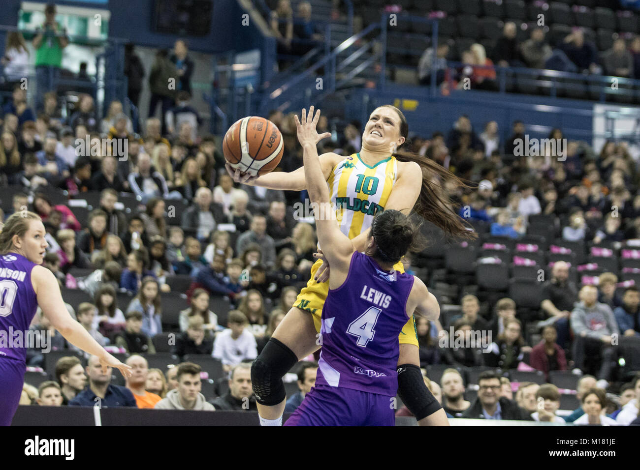 Birmingham, UK, 28th January, 2018. British Basketball, WBBL cup final between Nottingham Wildcats and Caledonia Pride. Wildcats' no 10, Lana Doran jumps for the ball. Pride's no 4 Robyn Lewis defends. Arena Birmingham. Credit: Carol Moir / Alamy Live News. Stock Photo