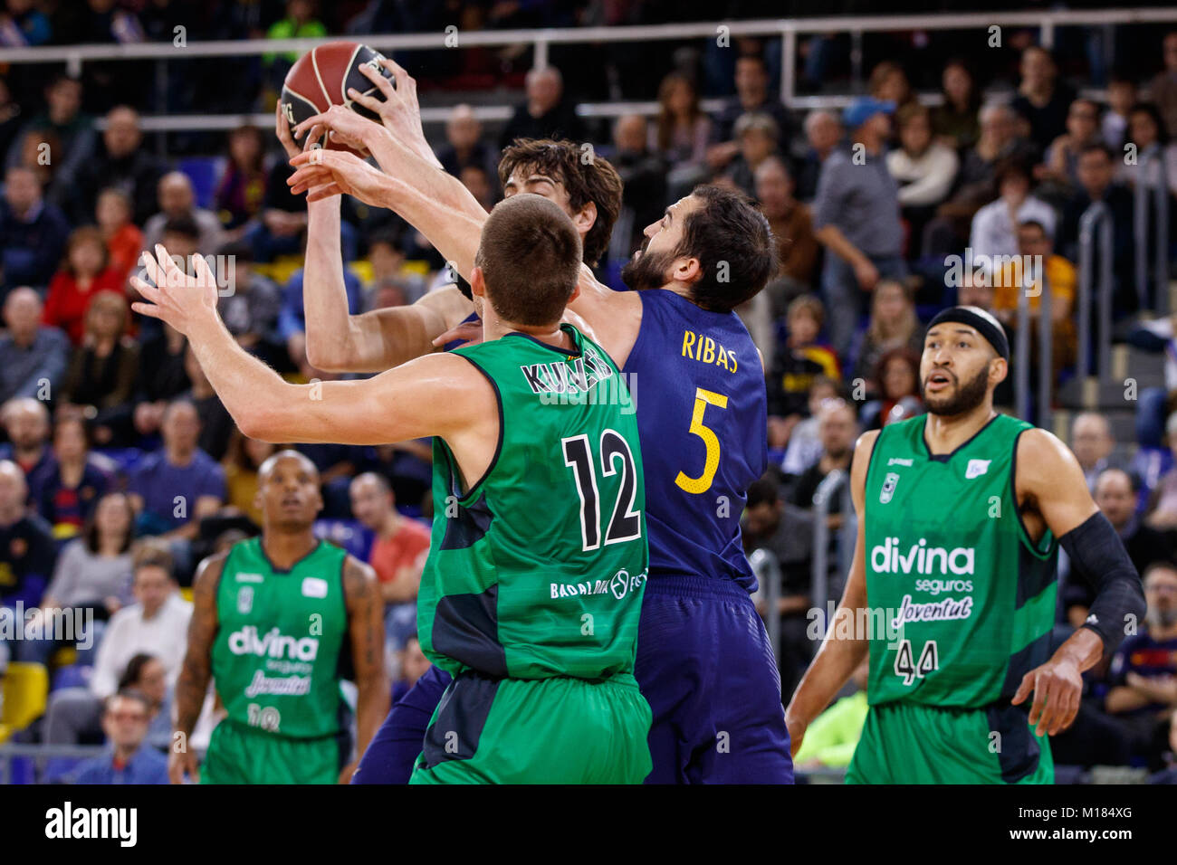 Barcelona, Spain. 28th Jan, 2018. Palau Blaugrana, January 28, match between FC Barcelona Lassa and Divina Joventut. Liga Endesa. Ante Tomic, Pau Ribas and Saulius Kulvietis fighting foe a ball. Credit: UKKO Images/Alamy Live News Stock Photo