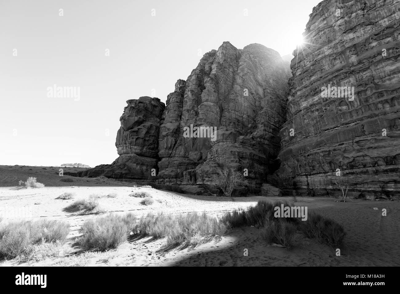 Beautiful scenic view of colorful mountain range in the wadi rum with a deep split in a rock, Jordan Stock Photo