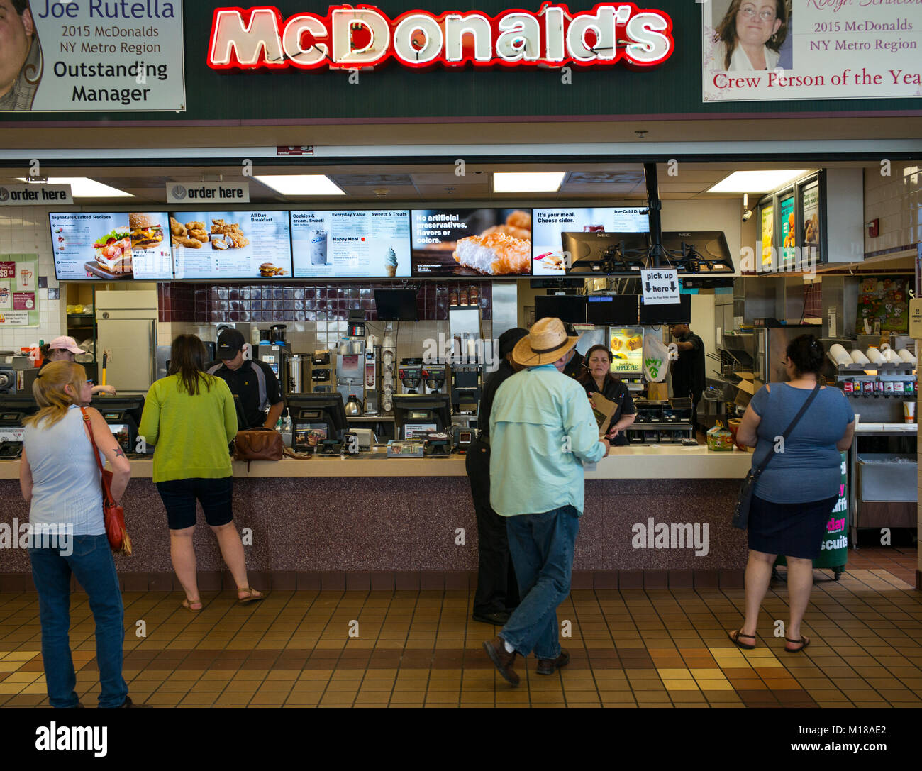 Customers purchase food at a McDonald's restaurant along the New York State Thruway in Plattekill, New York. Stock Photo