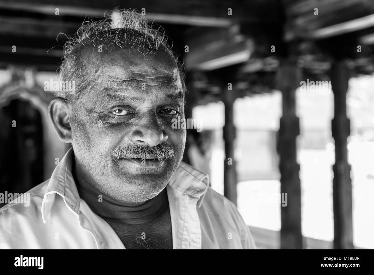 KANDY, SRI LANKA – February 13, 2017 : Portrait of man from Sri Lanka  (monochrome) Stock Photo
