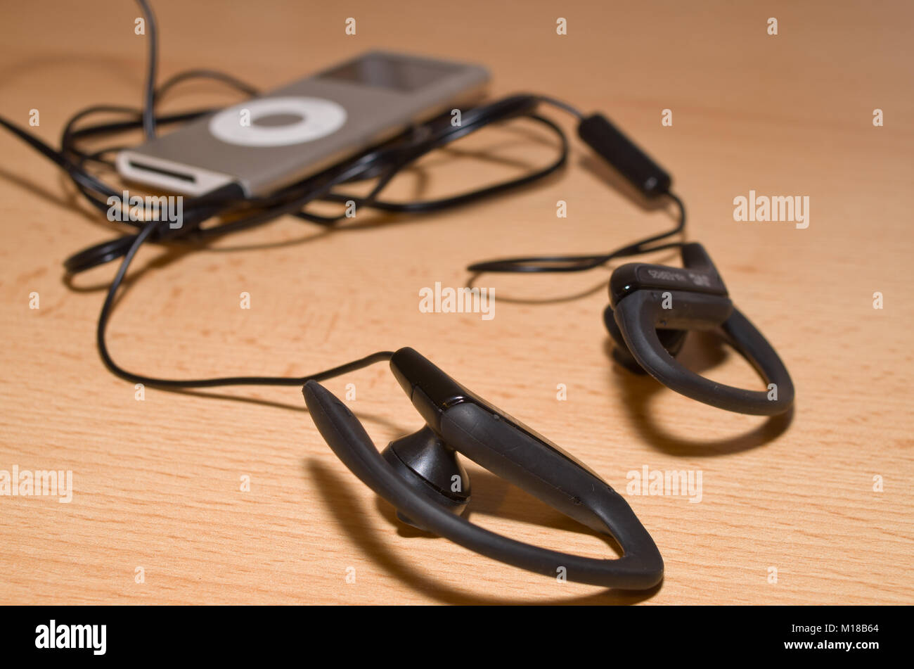 Old ipod and headphones uk Stock Photo