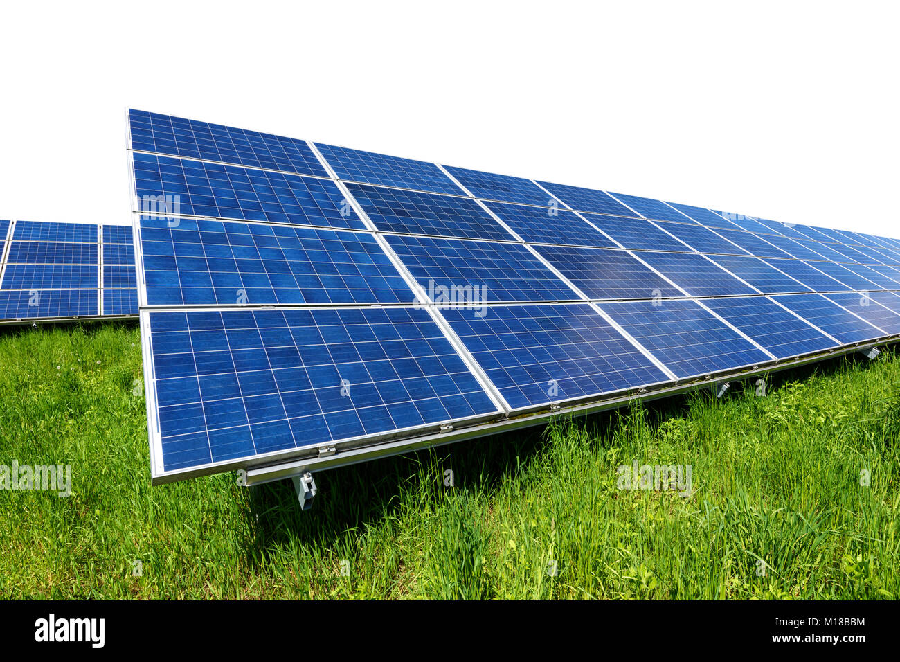 Solar panel on green grass isolated on white background Stock Photo