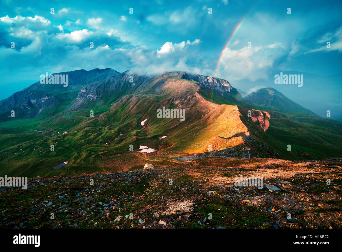 Amazing rainbow on the top of Grossglockner pass Stock Photo