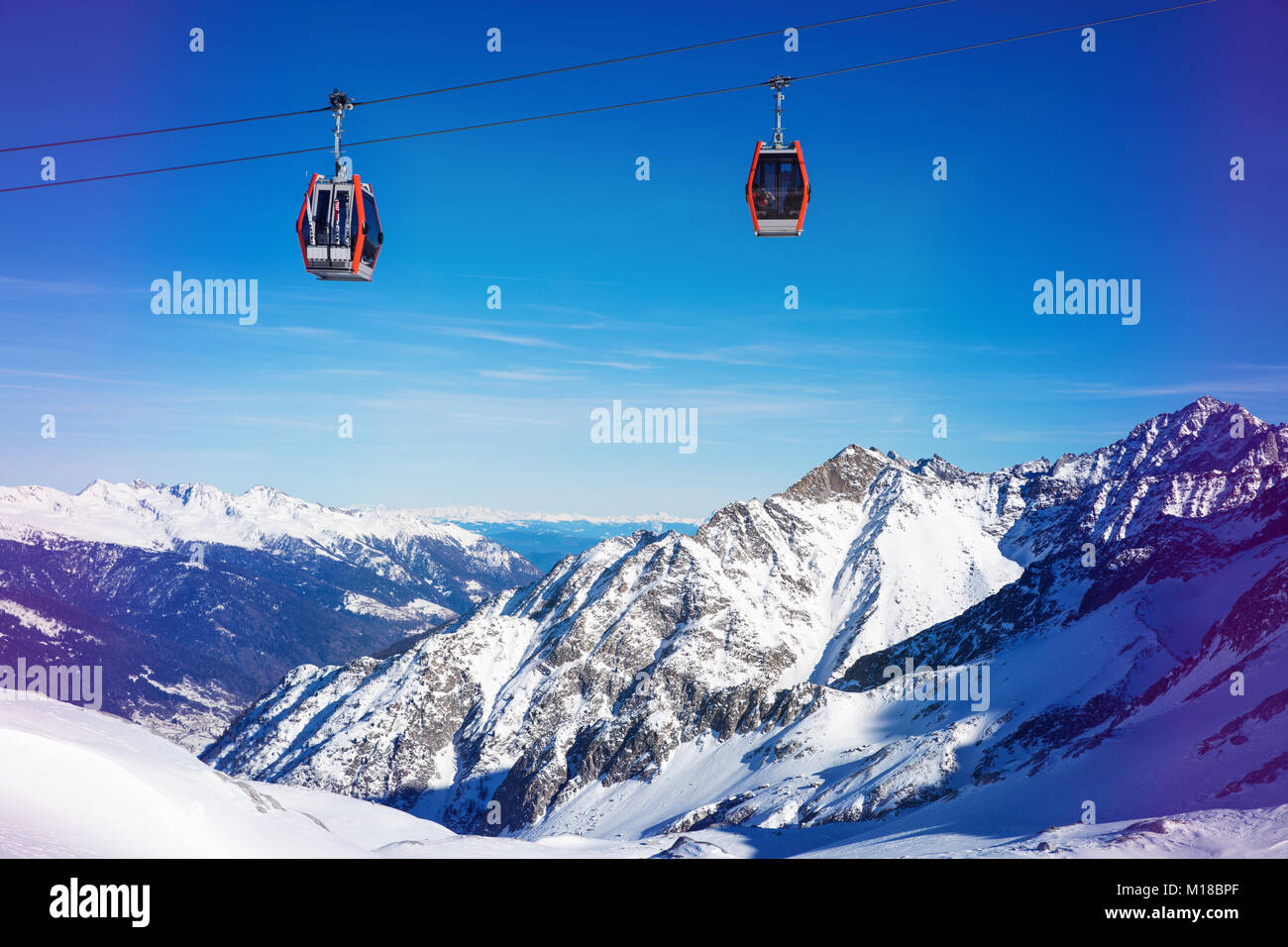 ski resort cable cars over beautiful mountain landscape at Italy Alps Stock Photo
