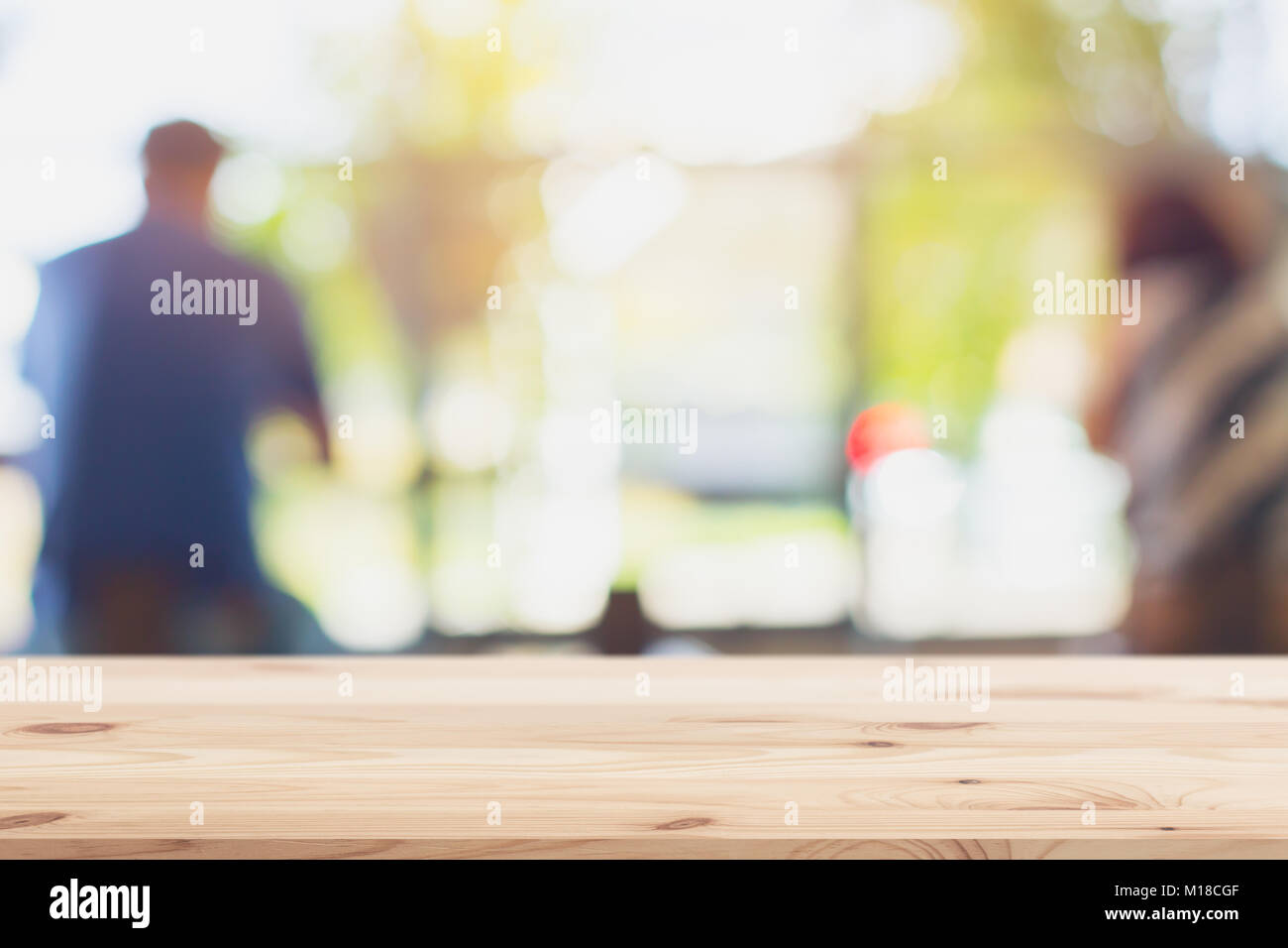 blur cafe with wood table for background display products template Stock Photo