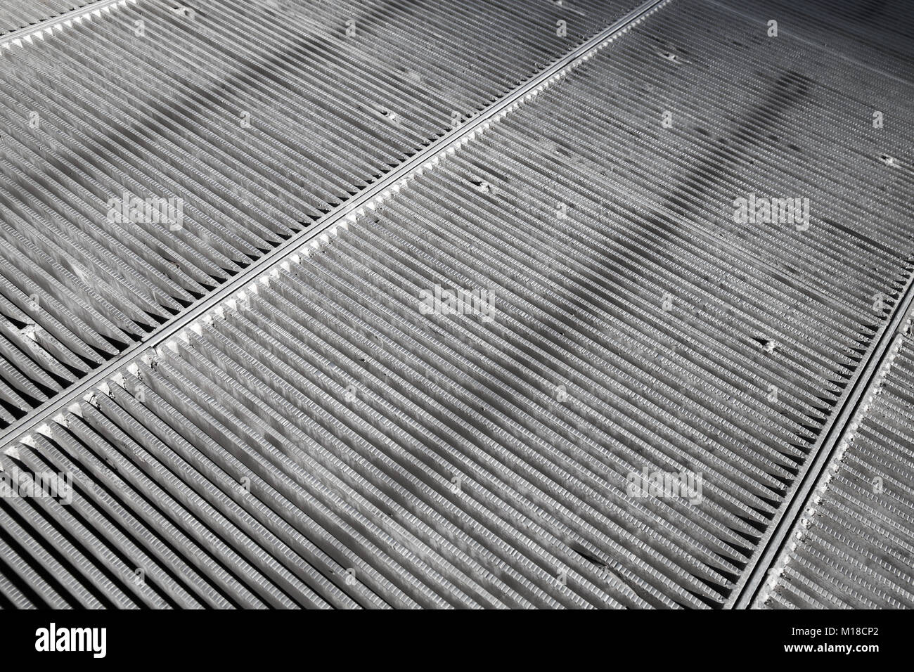 Steel grating of urban drainage system, abstract background photo Stock Photo