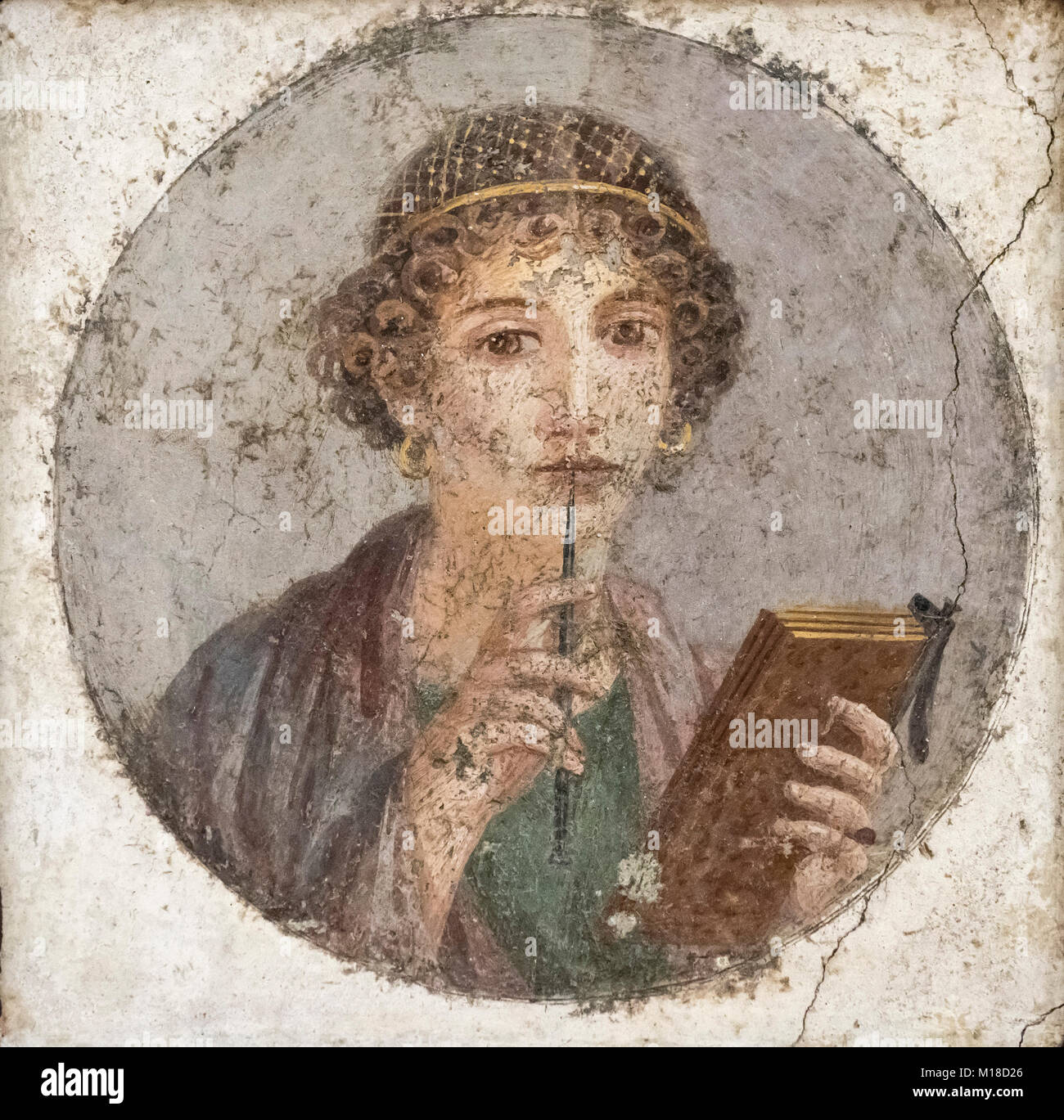 Naples. Italy. Portrait of a young woman (aka Sappho) holding wax tablets and stylus, 55-79 A.D. Museo Archeologico Nazionale di Napoli. Stock Photo