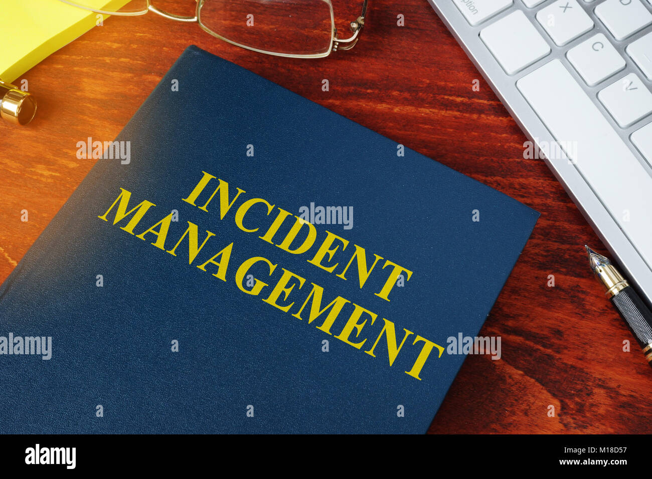 Incident Management concept. Book on the office desk. Stock Photo