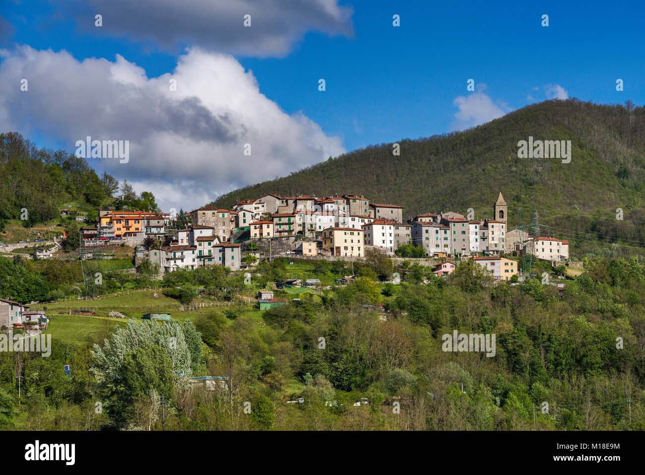 Hill town of Mammiano Basso near San Marcello Pistoiese, Tuscan–Emilian Apennines, view from Via Giardini, road SS12, Tuscany, Italy Stock Photo
