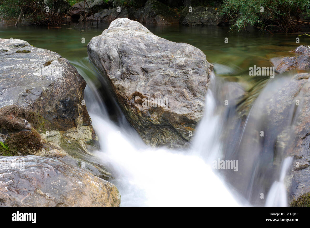 water gushing over rocks in the the French Pyrenees Stock Photo