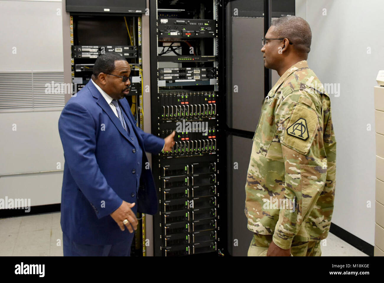 Ralph Edmonds, left, showcases a portion of Fort Belvoir’s LMR equipment to Brig. Gen. Patrick W. Burden, program executive officer for EIS. In 2014, PEO EIS’ LMR product office began developing a plan to address a handful of threats to the readiness of Army LMR systems in the U.S., including a complex requirement, only two suppliers and a shrinking pool of appropriated funds. ( Stock Photo