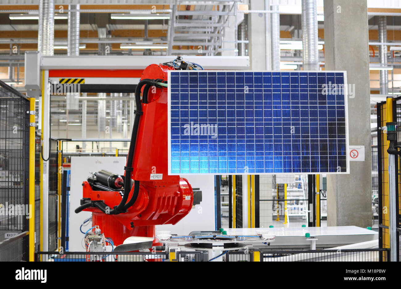 robots in the production of solar cells in the hitech industry - equipment in a factory Stock Photo