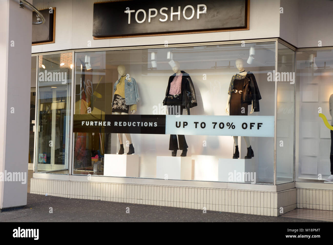 Sale signs in window of Topshop as reductions continue through January in  Bedford Bedfordshire England Stock Photo - Alamy
