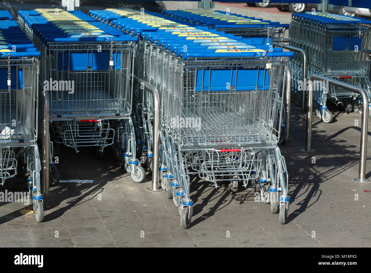 Row of shopping carts in front of shopping centre, Germany, Europe I Einkaufswagen in einer Reihe vor einem Einkaufszentrum, Verden an der aller, Nied Stock Photo