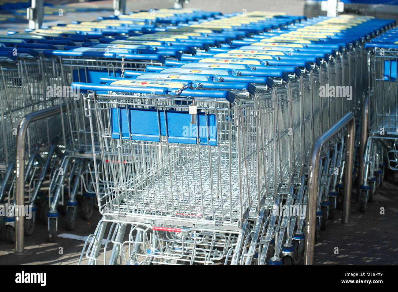 Row of shopping carts in front of shopping centre, Germany, Europe I Einkaufswagen in einer Reihe vor einem Einkaufszentrum, Verden an der aller, Nied Stock Photo