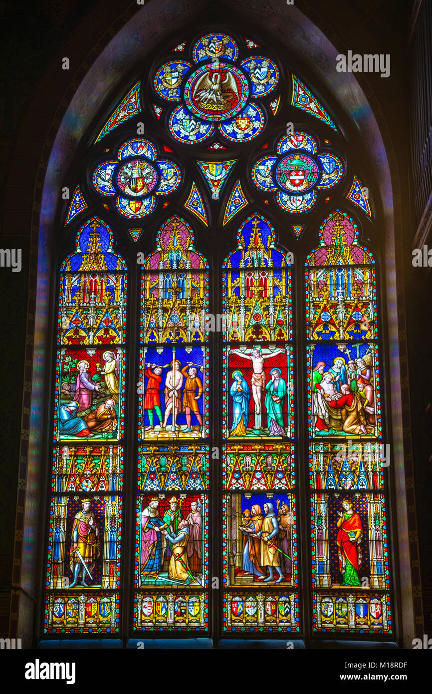 Bruges, Belgium - April 18, 2017: Stained glass window of the Basilica of the Holy Blood, Bruges, Belgium. Stock Photo