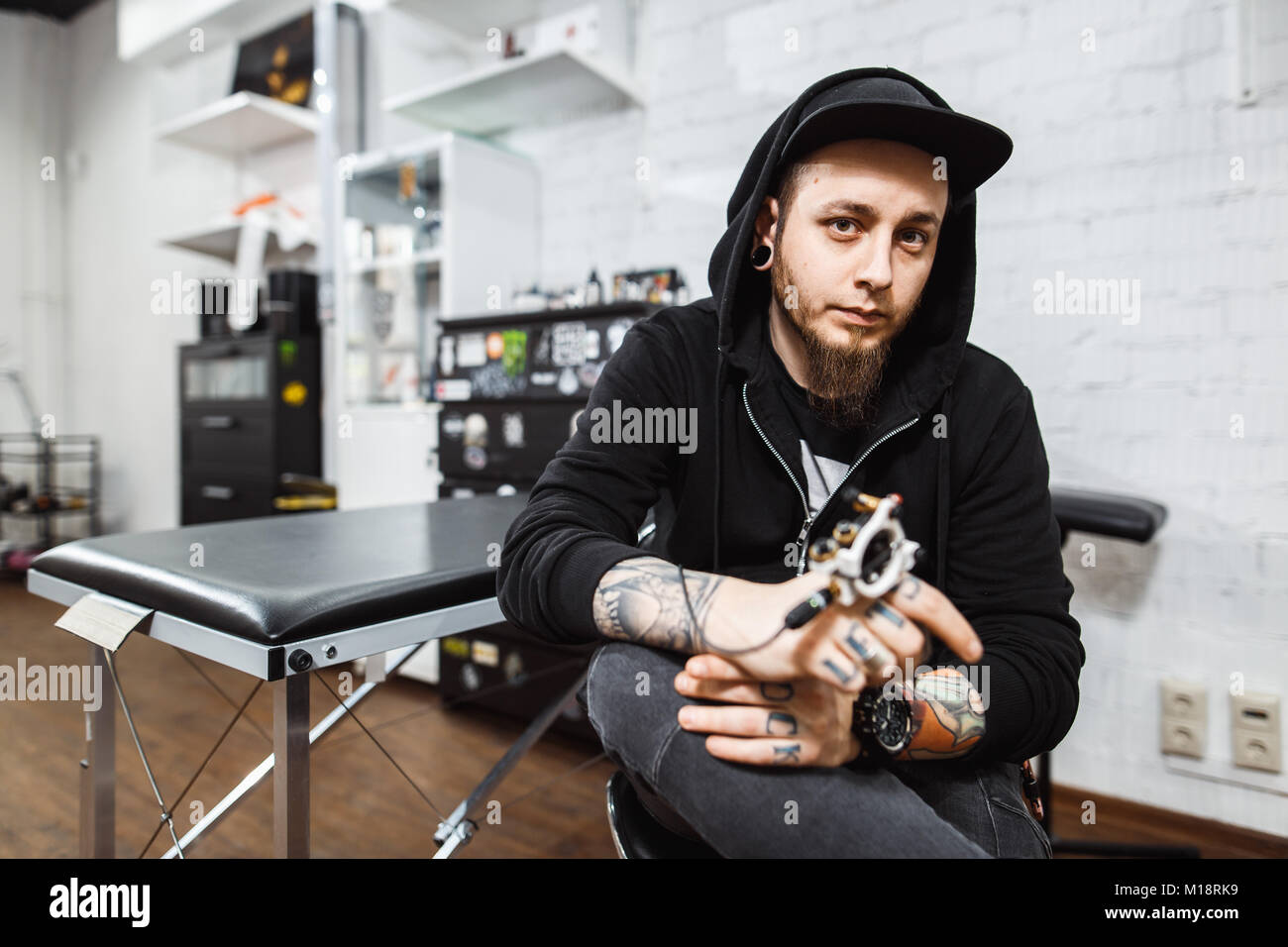 Portrait of professional creative tattoo master Stock Photo