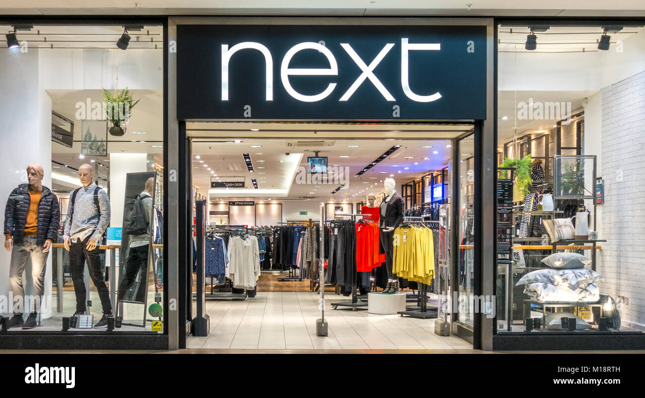 Next shop / store / branch entrance, with no-one in sight, in the Queensgate shopping centre, Peterborough city, Cambridgeshire, England, UK. Stock Photo
