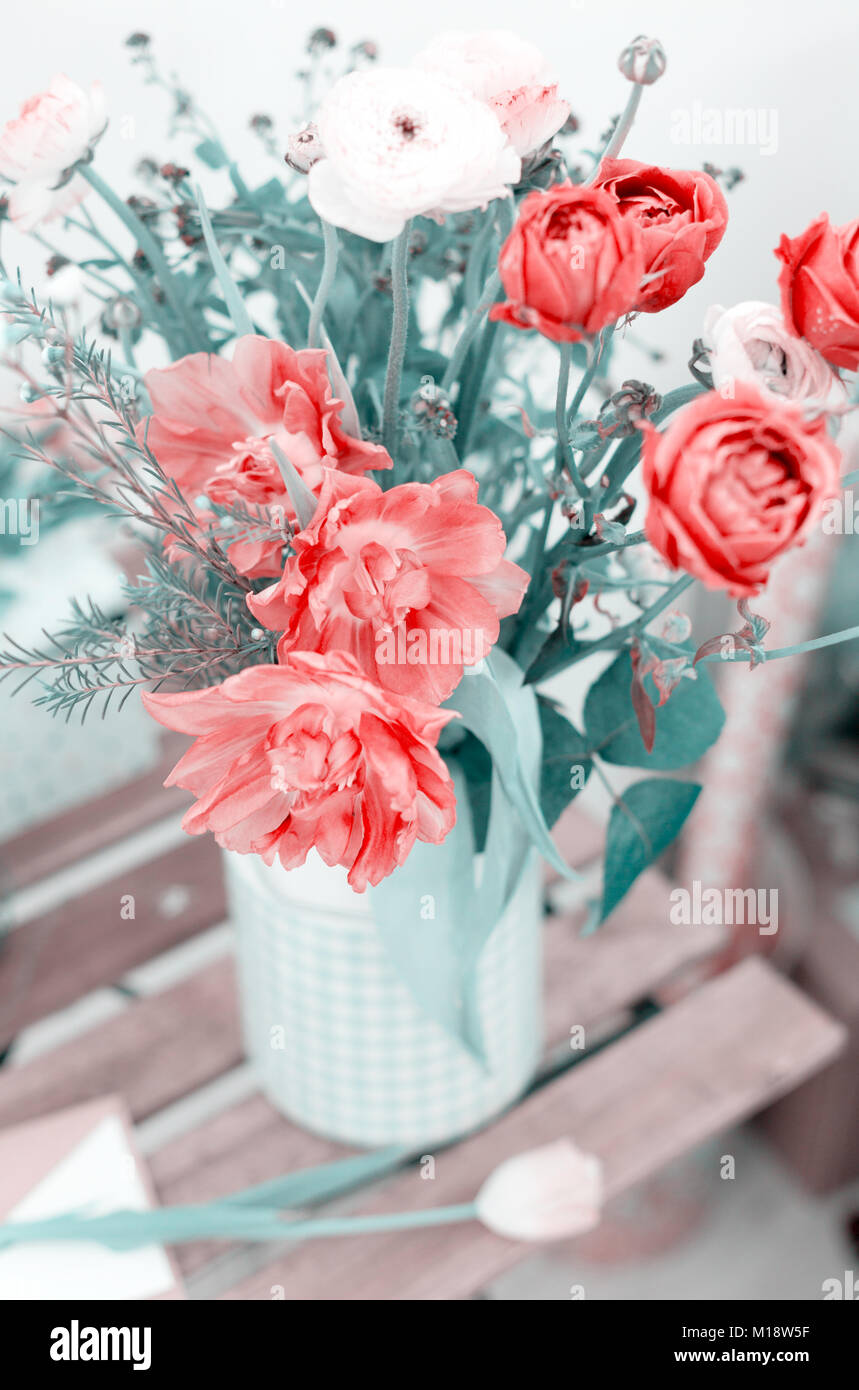 Amazing rose tulips in a vase in a bench Stock Photo