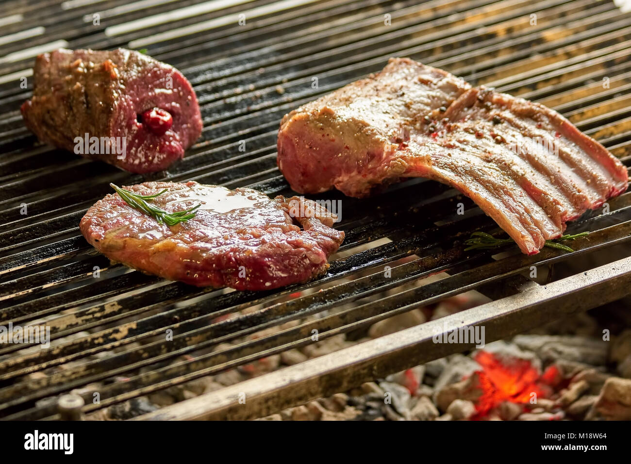 Grilling pieces of pork Stock Photo Alamy