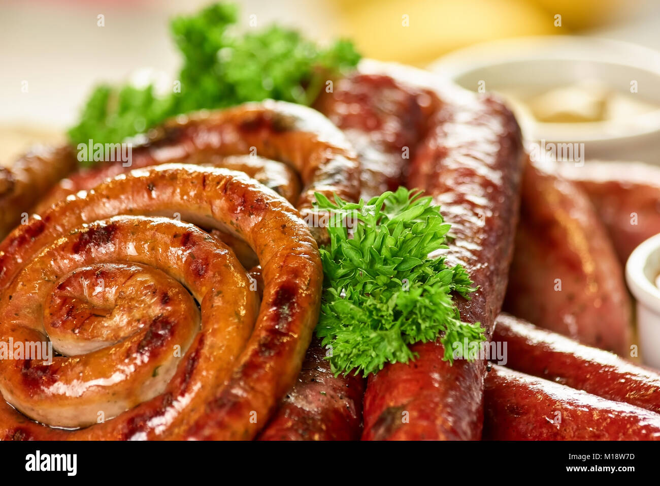 Juicy sausage spirals, closeup Stock Photo - Alamy