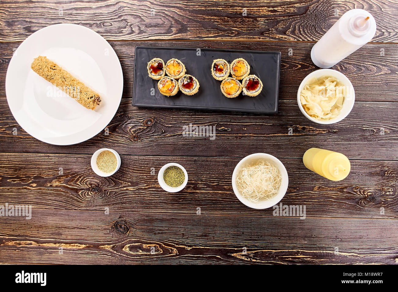 Cut and uncut rolls unagi furay and side dish. Stock Photo